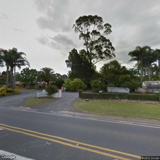 Palm Grove Cottages Motel